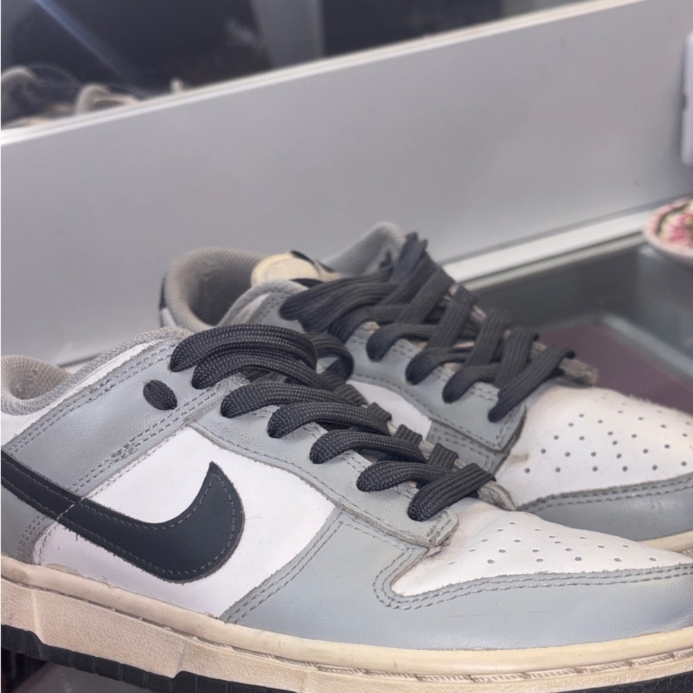 Nike Gray and Cream Sneakers with Black Swoosh